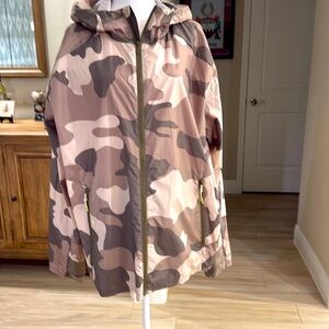 Zip up hooded light jacketed. 100% polyester